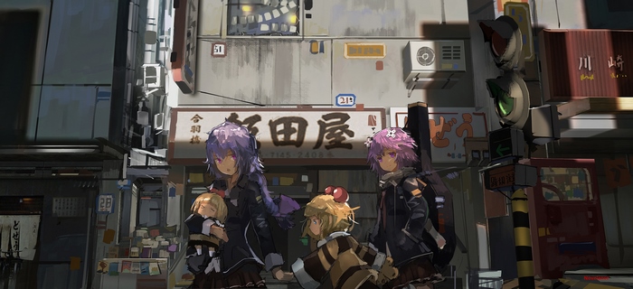 Four girls in a Japanese city street
