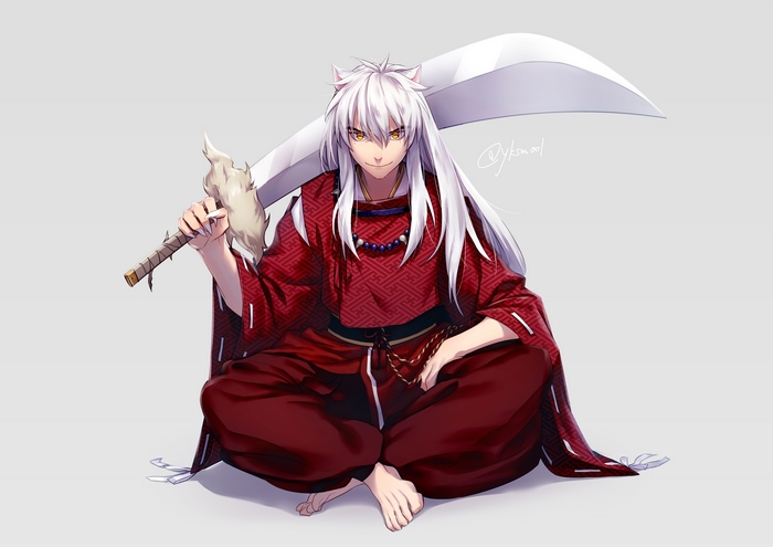 Inuyasha sitting with his sword