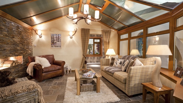 Cozy living room with fireplace and skylight