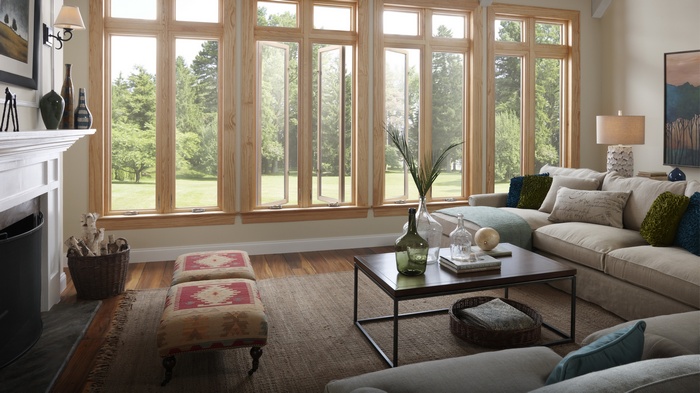 Living room with large windows and sectional sofa