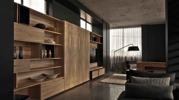 Modern living room with wooden shelves and floor lamp