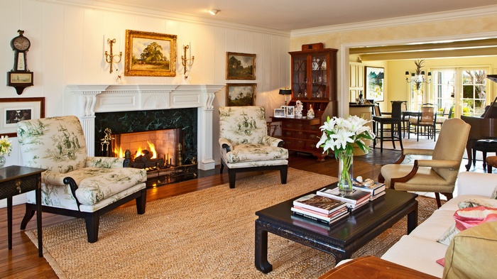 Living room with fireplace and dining area