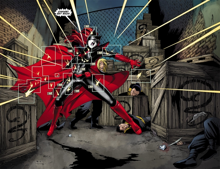 Batwoman in a dark alleyway