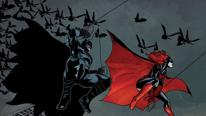 Batman and Batwoman with bats