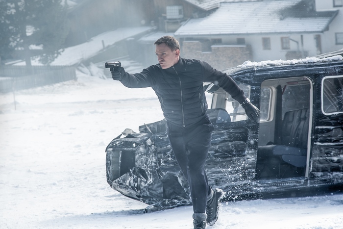 James Bond in a snowy environment with a crashed helicopter