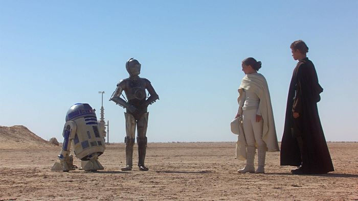 C-3PO and R2-D2 with Anakin and Padmé on Tatooine