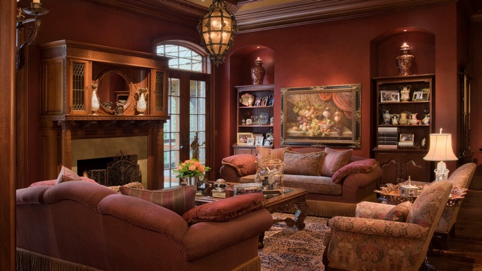 Luxurious living room with antique furniture and fireplace