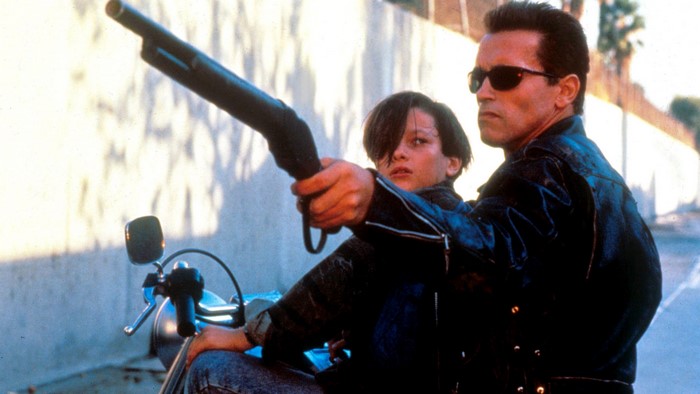 The Terminator T-800 and John Connor on a motorcycle