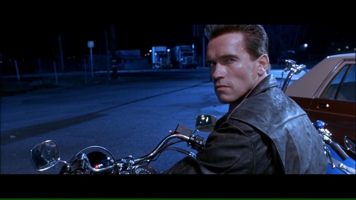 The Terminator on a motorcycle at night