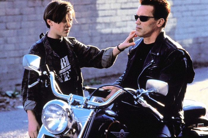 The Terminator and John Connor on a motorcycle