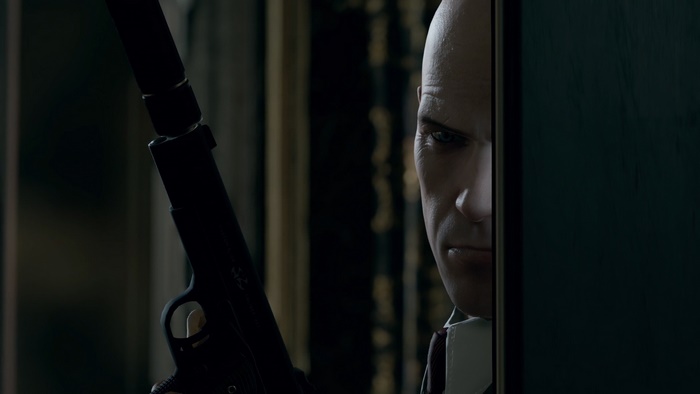 Agent 47 with a silenced pistol