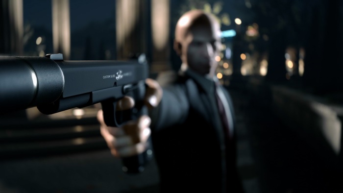 Agent 47 holding a pistol