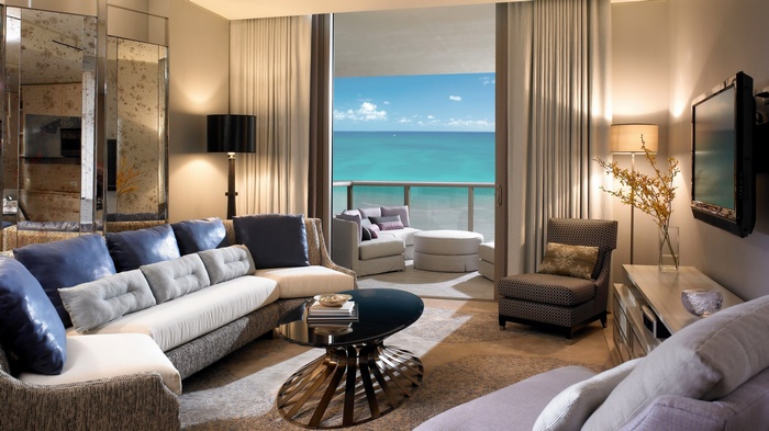 Living room with ocean view balcony