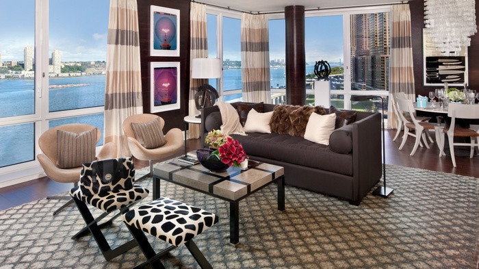 Living room with city view and dining area