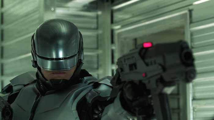 RoboCop holding a gun