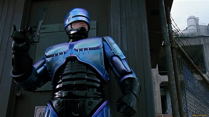 RoboCop holding a gun