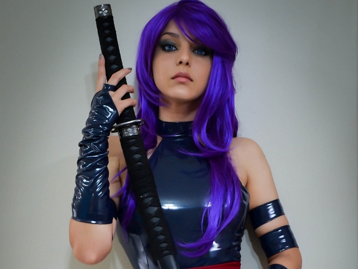Psylocke from Marvel Comics holding a katana