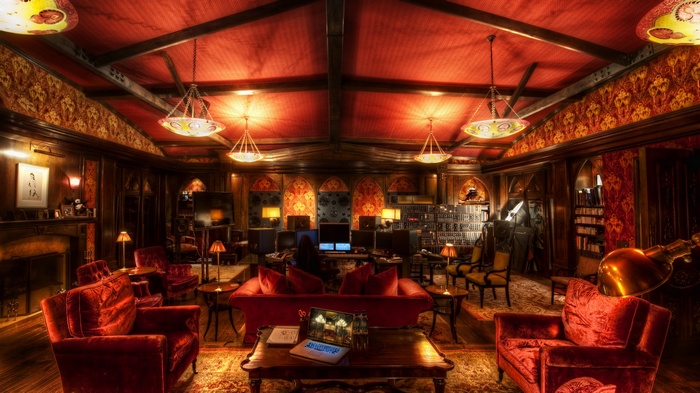 Luxurious red velvet lounge with recording studio equipment