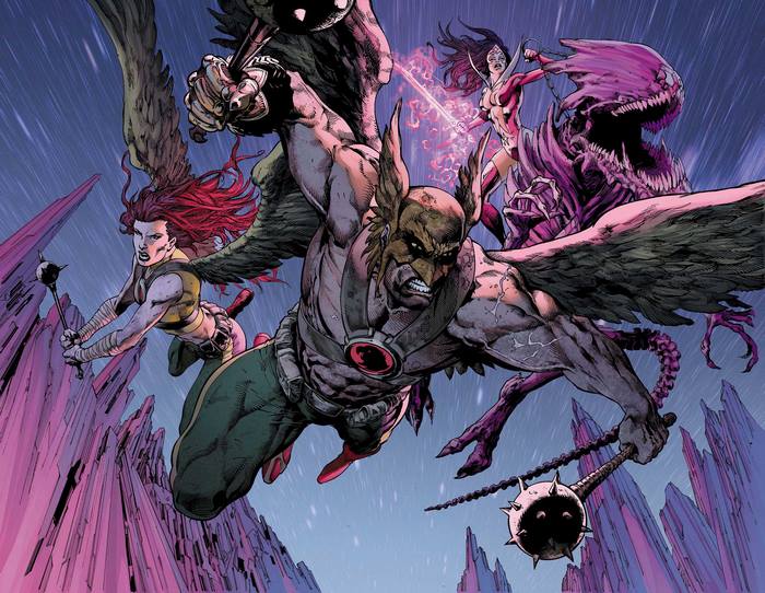 Hawkman and allies fighting a monster