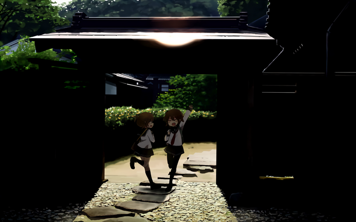 Two schoolgirls in a Japanese garden