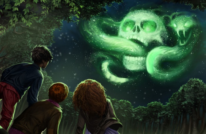 Harry Potter and Ron Weasley watch a spectral skull and snake