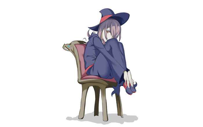 Sucy Manbavaran sitting on a chair