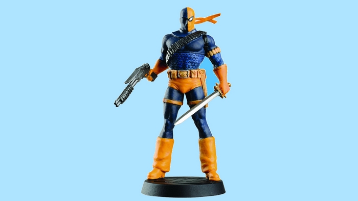 Deathstroke from DC Comics holding a gun and sword