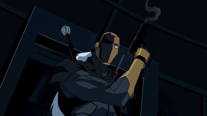 Deathstroke from DC Comics holding a gun