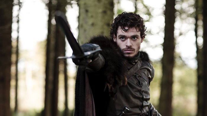 Robb Stark from Game of Thrones holding a sword