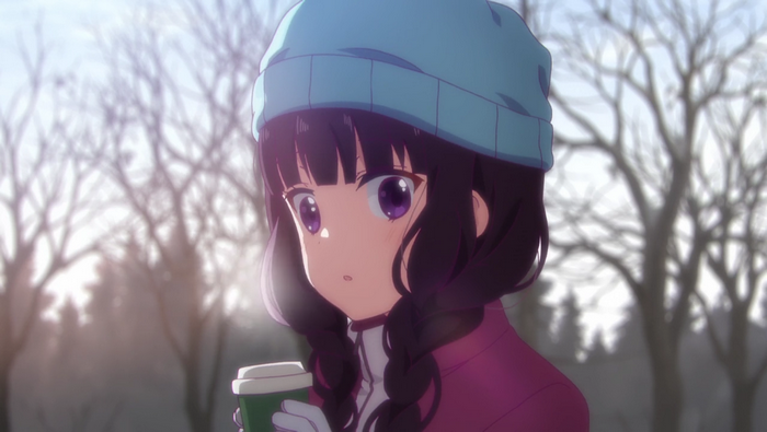 Maika Sakuranomiya holding a coffee cup