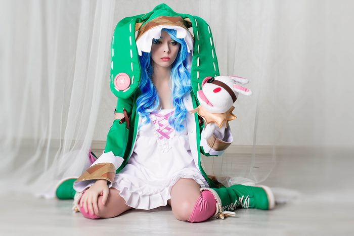 Yoshino from Date A Live holding a plush toy