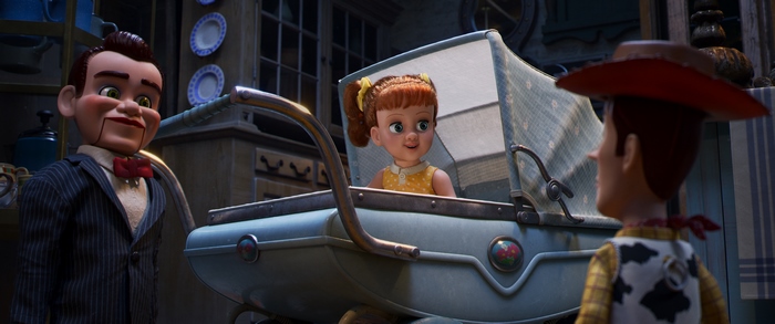 Gabby Gabby, Woody, and a baby doll in a stroller