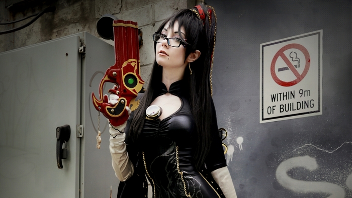 Bayonetta with gun and glasses