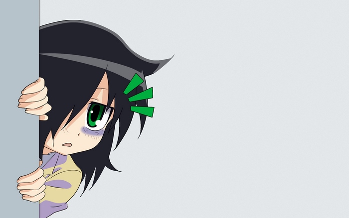 Tomoko Kuroki peeking from behind a wall