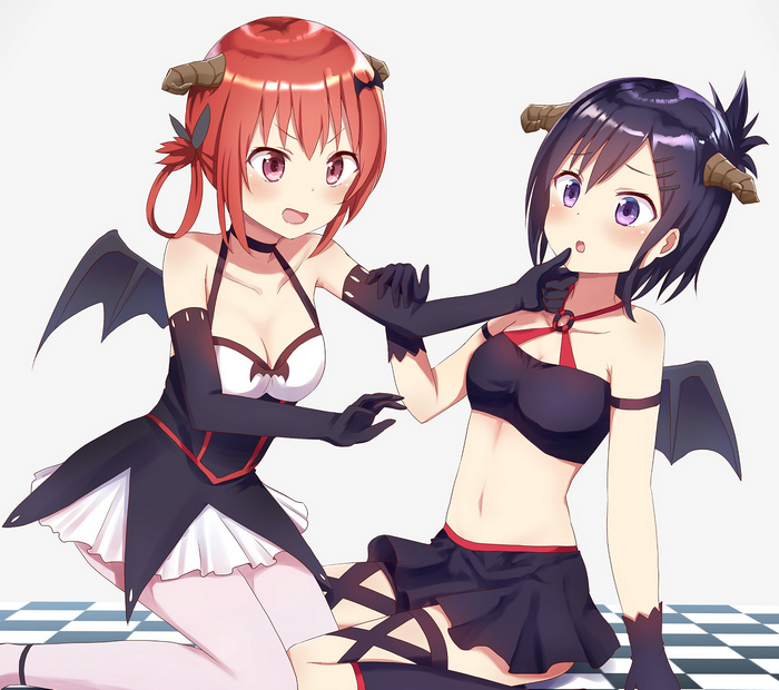 Two demon girls in costumes