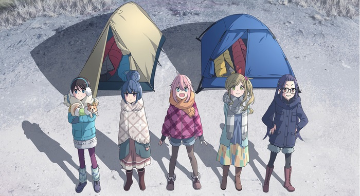 Five girls camping with tents in the snow