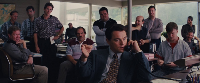 Jordan Belfort and his associates in an office