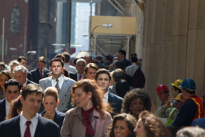 Jordan Belfort walking through a crowd
