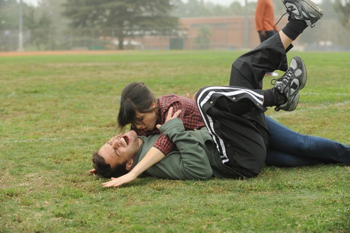Nick Miller wrestling on grass
