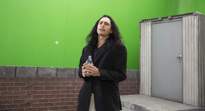 James Franco holding a water bottle