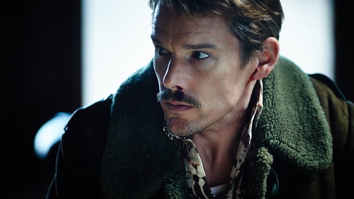 Ethan Hawke in a green coat
