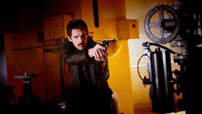 Ethan Hawke holding a gun