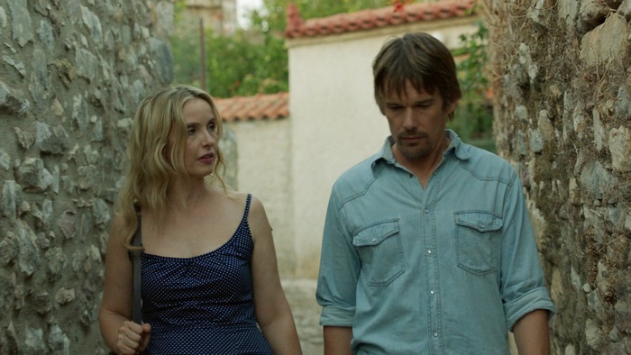 Ethan Hawke and woman walking