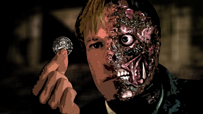 Two-Face from Batman holding a coin