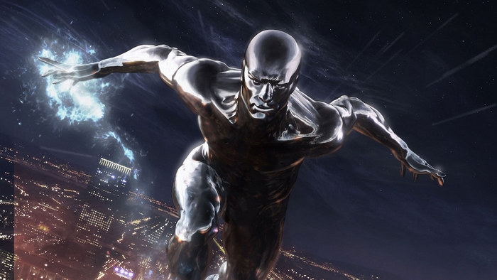 Silver Surfer flying over a city at night
