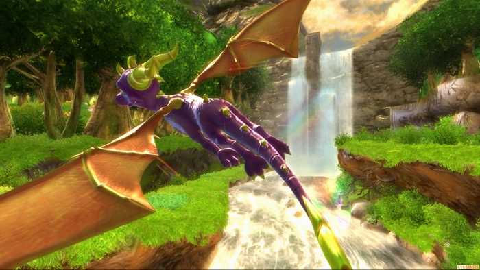 Spyro the Dragon flying over a waterfall