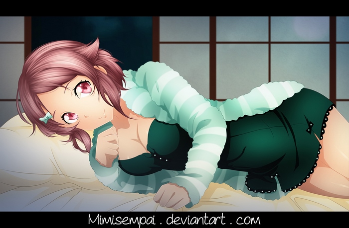 Rika Shinozaki lying on a bed