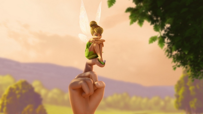 Tinker Bell sitting on a finger