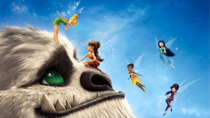 Tinker Bell and friends with a creature