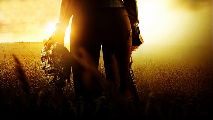Terminator holding a robot head in a field